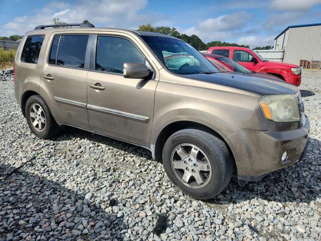 Photo 4 from auction – 2010 HONDA PILOT TOUR with VIN 5FNYF4H98AB039661