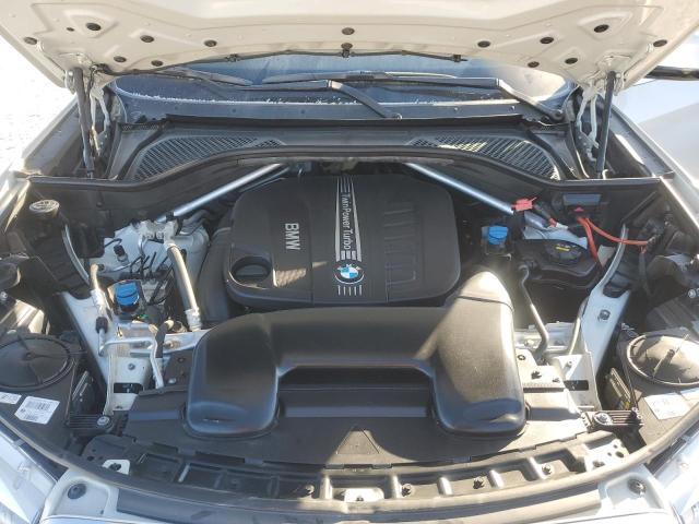 Photo 12 from auction – 2014 BMW X5 XDRIVE3 with VIN 5UXKS4C53E0J94868