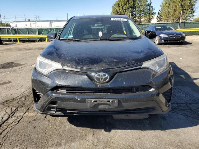 Photo 5 from auction – 2018 TOYOTA RAV4 LE with VIN 2T3BFREV0JW734232