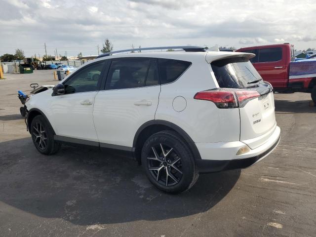 Photo 2 from auction – 2018 TOYOTA RAV4 SE with VIN JTMNFREV3JD130216