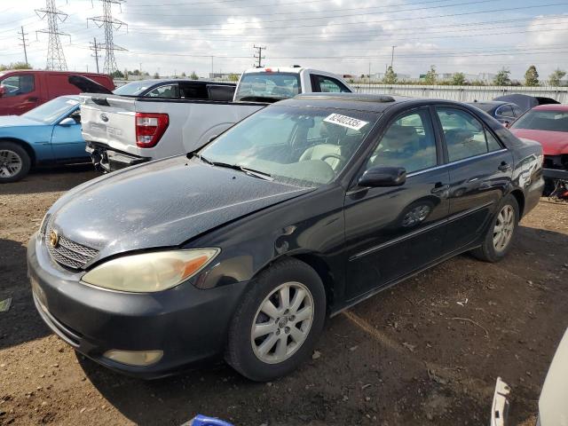 TOYOTA CAMRY LE 2004 with VIN 4T1BE30K64U303064 - Photo from auction