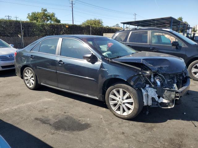 Photo 4 from auction – 2012 TOYOTA CAMRY HYBR with VIN 4T1BD1FKXCU049128