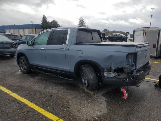 Photo 2 from auction – 2023 HONDA RIDGELINE with VIN 5FPYK3F76PB013972