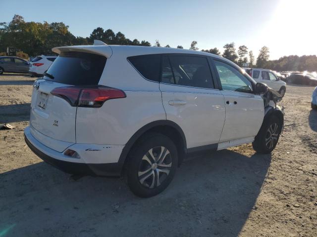 Photo 3 from auction – 2018 TOYOTA RAV4 LE with VIN 2T3BFREV3JW852968