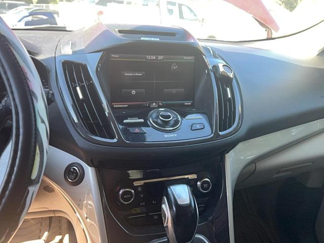 Photo 13 from auction – 2013 FORD ESCAPE SEL with VIN 1FMCU0HX0DUC20347