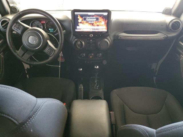 Photo 8 from auction – 2014 JEEP WRANGLER U with VIN 1C4BJWDG1EL115812