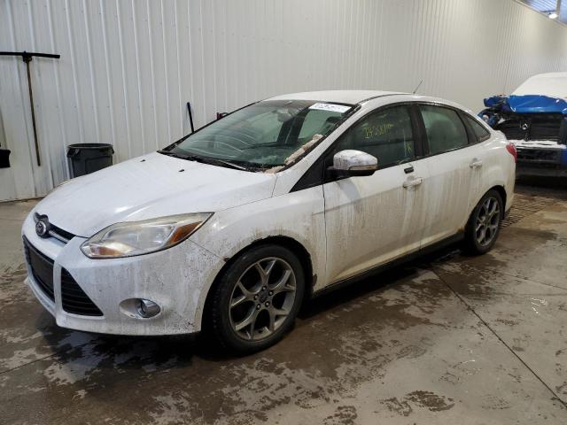 FORD FOCUS SE 2014 with VIN 1FADP3F24EL385257 - Photo from auction