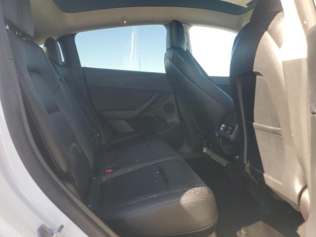 Photo 11 from auction – 2022 TESLA MODEL Y with VIN 7SAYGDEE2NF411115