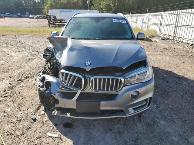 Photo 5 from auction – 2014 BMW X5 XDRIVE3 with VIN 5UXKR0C5XE0H21473