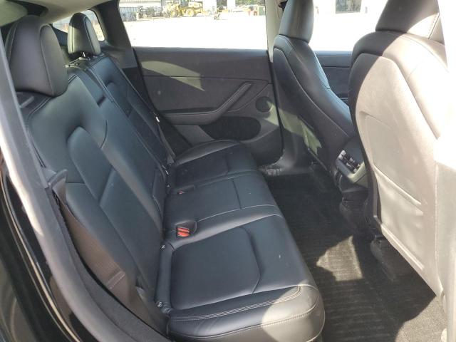 Photo 10 from auction – 2023 TESLA MODEL Y with VIN 7SAYGDEE8PA141095