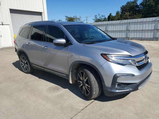 Photo 4 from auction – 2021 HONDA PILOT ELIT with VIN 5FNYF6H01MB053810