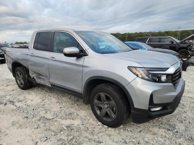 Photo 4 from auction – 2023 HONDA RIDGELINE with VIN 5FPYK3F59PB002320
