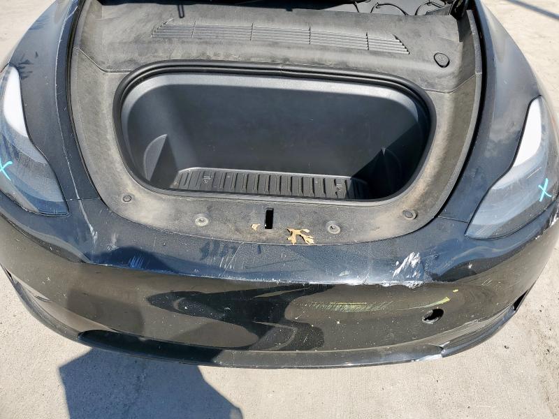 Photo 11 from auction – 2023 TESLA MODEL Y with VIN 7SAYGDED4PF940057
