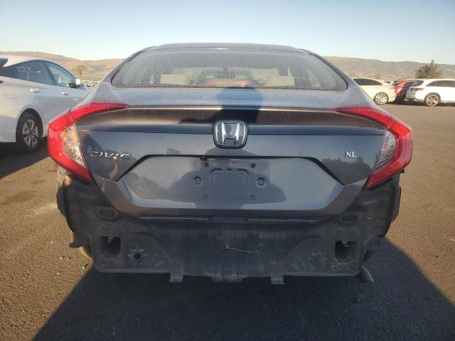 Photo 6 from auction – 2017 HONDA CIVIC LX with VIN 19XFC2F51HE045421