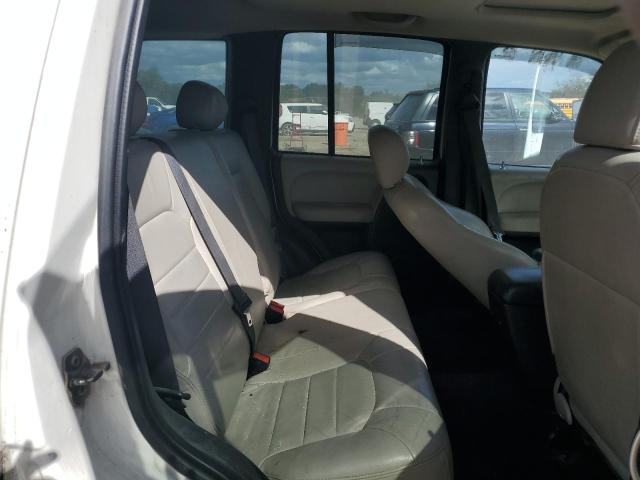 Photo 11 from auction – 2003 JEEP LIBERTY LI with VIN 1J4GL58K63W687490