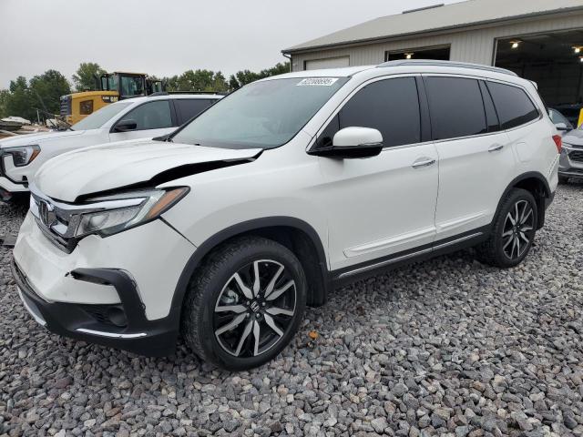 HONDA PILOT TOUR 2020 with VIN 5FNYF6H68LB011685 - Photo from auction