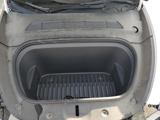 Photo 11 from auction – 2022 TESLA MODEL Y with VIN 7SAYGDEE2NF370193