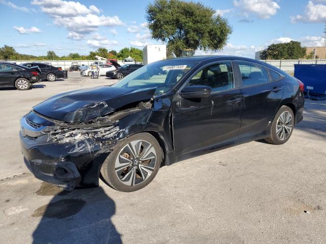 HONDA CIVIC EX 2017 with VIN 19XFC1F41HE014820 - Photo from auction