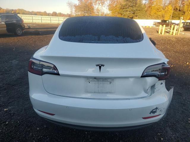 Photo 6 from auction – 2020 TESLA MODEL 3 with VIN 5YJ3E1EA0LF709913