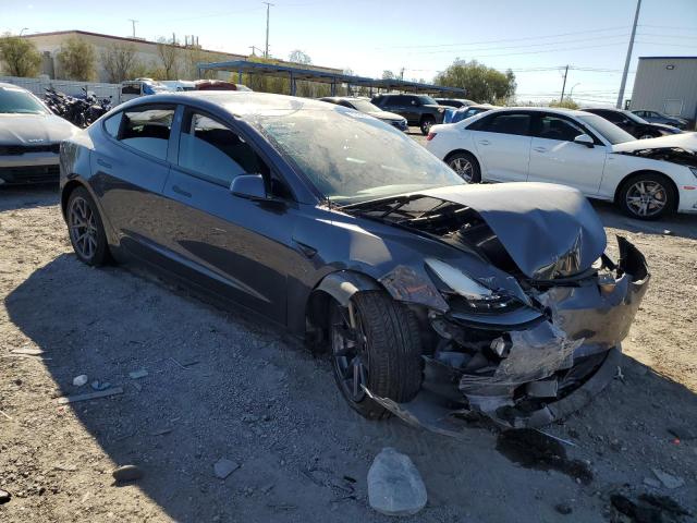 Photo 4 from auction – 2021 TESLA MODEL 3 with VIN 5YJ3E1EA9MF878247