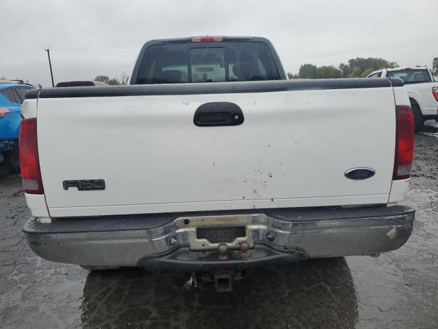 Photo 6 from auction – 2002 FORD F150 with VIN 1FTRX18L12NA58230