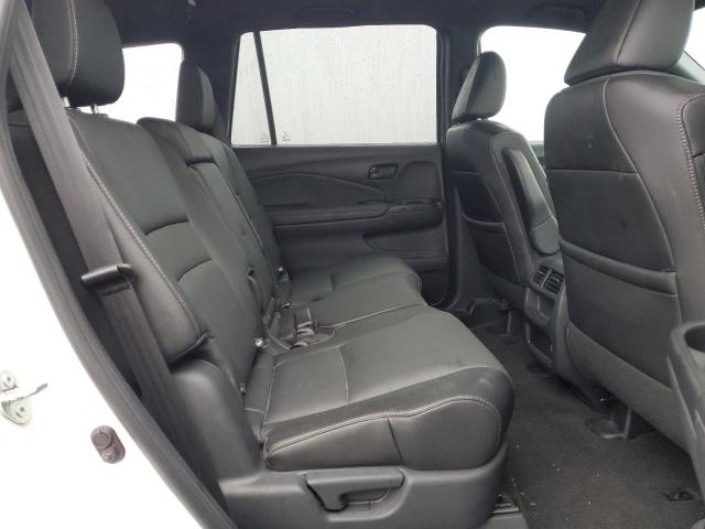 Photo 11 from auction – 2023 HONDA PASSPORT E with VIN 5FNYF8H50PB038291