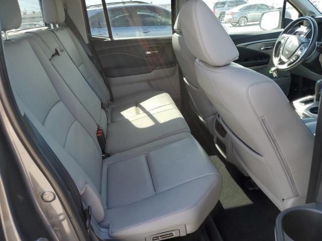 Photo 10 from auction – 2018 HONDA RIDGELINE with VIN 5FPYK2F69JB002618