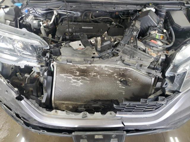 Photo 12 from auction – 2016 HONDA CR-V LX with VIN 5J6RM4H31GL117607