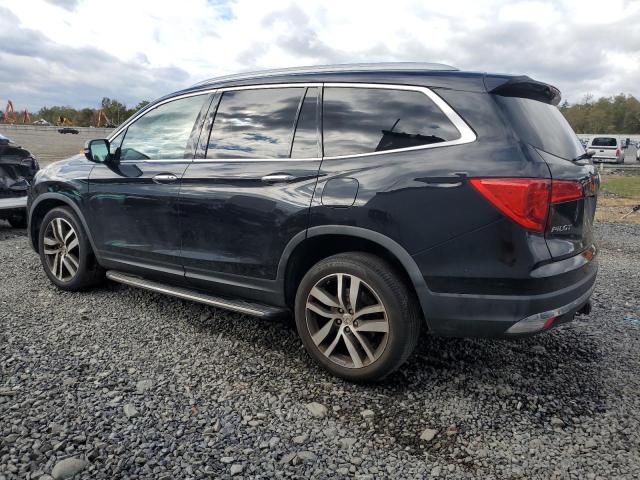Photo 2 from auction – 2016 HONDA PILOT ELIT with VIN 5FNYF6H02GB064819