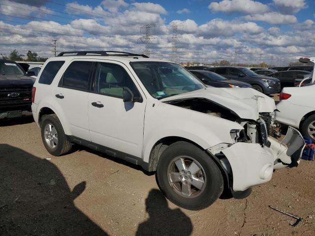 Photo 4 from auction – 2011 FORD ESCAPE XLT with VIN 1FMCU0D76BKA66032