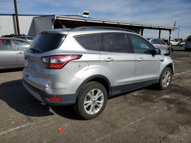 Photo 3 from auction – 2018 FORD ESCAPE SE with VIN 1FMCU9GD0JUA82249