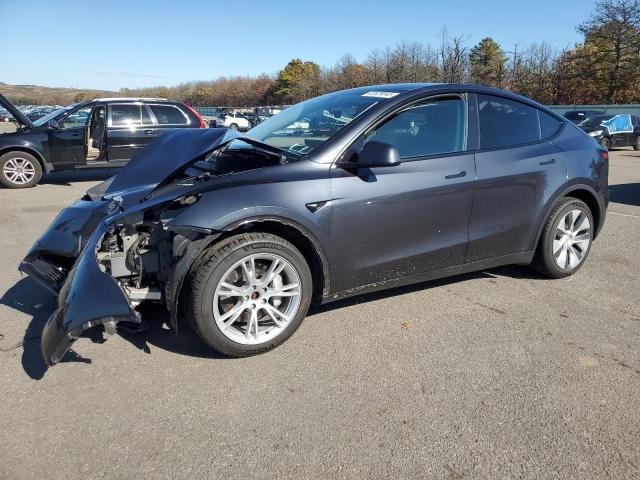 TESLA MODEL Y 2024 with VIN 7SAYGDEE0RA275764 - Photo from auction