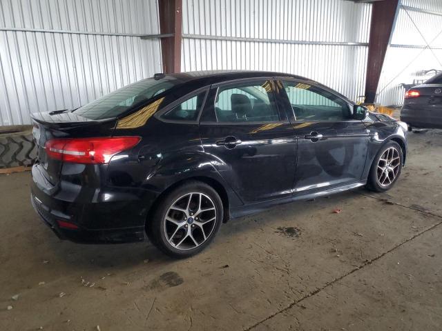Photo 3 from auction – 2016 FORD FOCUS SE with VIN 1FADP3F26GL258657