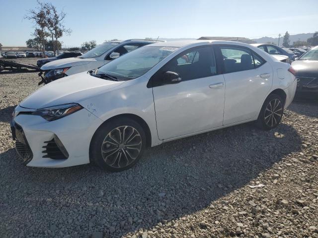 TOYOTA COROLLA L 2017 with VIN 5YFBURHE5HP668864 - Photo from auction