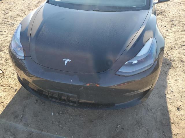 Photo 11 from auction – 2021 TESLA MODEL 3 with VIN 5YJ3E1EB1MF054672