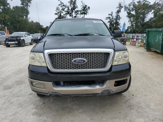 Photo 5 from auction – 2004 FORD F150 with VIN 1FTRX12584KB01749