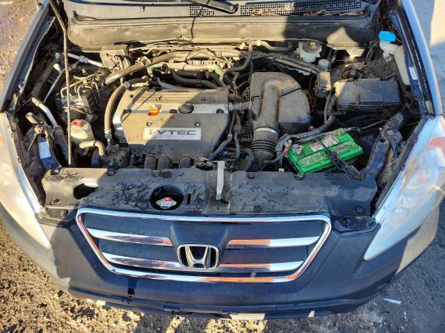 Photo 12 from auction – 2006 HONDA CR-V EX with VIN JHLRD77816C053428