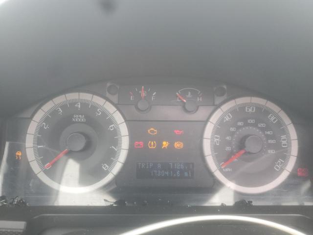 Photo 9 from auction – 2009 FORD ESCAPE LIM with VIN 1FMCU04719KB93930