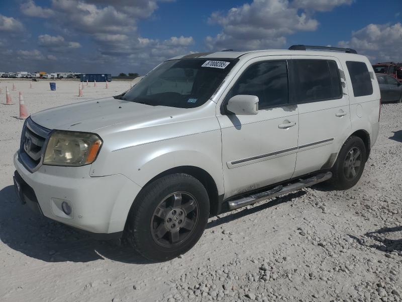 HONDA PILOT TOUR 2011 with VIN 5FNYF3H9XBB036546 - Photo from auction