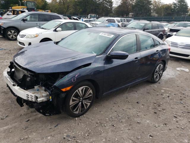 HONDA CIVIC EX 2017 with VIN 19XFC1F39HE010621 - Photo from auction