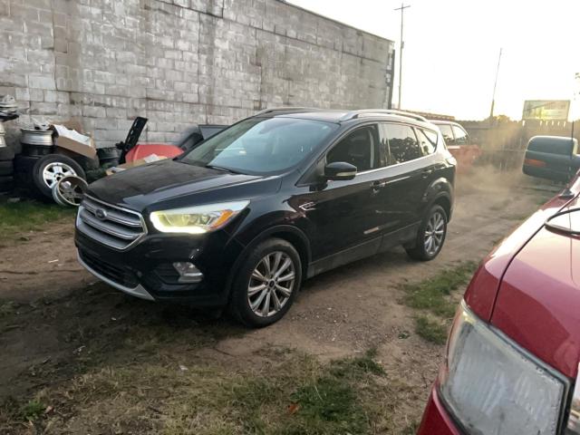 Photo 2 from auction – 2017 FORD ESCAPE TIT with VIN 1FMCU0JD0HUE93018