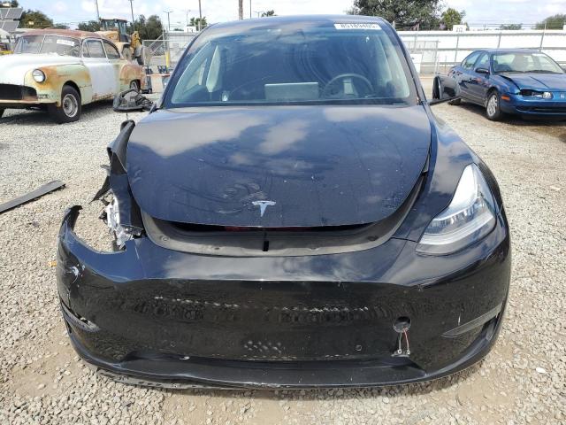 Photo 5 from auction – 2022 TESLA MODEL Y with VIN 7SAYGAEE0NF340771