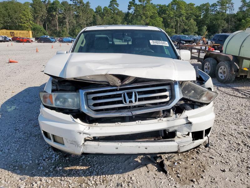 Photo 5 from auction – 2014 HONDA RIDGELINE with VIN 5FPYK1F52EB012074