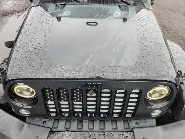 Photo 12 from auction – 2014 JEEP WRANGLER U with VIN 1C4BJWEG1EL254773