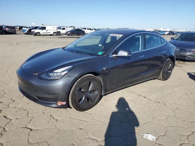 TESLA MODEL 3 2018 with VIN 5YJ3E1EA1JF058689 - Photo from auction