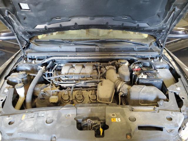 Photo 11 from auction – 2013 FORD TAURUS SEL with VIN 1FAHP2E85DG214624