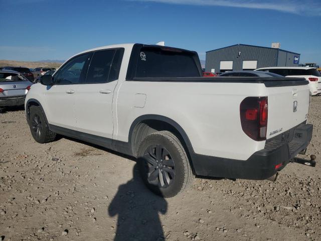 Photo 2 from auction – 2021 HONDA RIDGELINE with VIN 5FPYK3F12MB011434