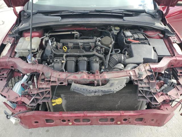 Photo 11 from auction – 2014 FORD FOCUS TITA with VIN 1FADP3J28EL159648