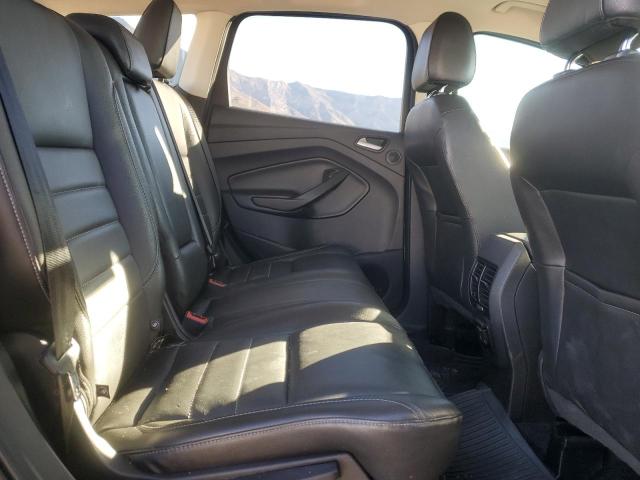 Photo 11 from auction – 2016 FORD ESCAPE TITANIUM with VIN 1FMCU9J90GUA68669