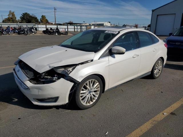FORD FOCUS TITA 2015 with VIN 1FADP3J24FL274572 - Photo from auction